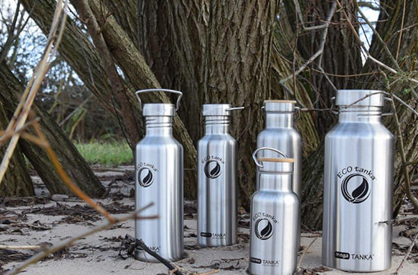 ECOtanka bottles in the sand